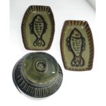 Two Southwold Studio pottery dishes, the interior painted with fish, 19cm long (2)