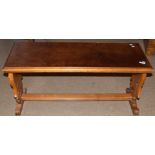 Modern coffee table with eagle finial stretcher, 110cm wide