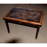 20th century coffee table with drawer, the top carved with leaves and portrait, inscribed "Albert