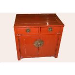 20th century Chinese style hardwood cupboard, two drawers over two doors, painted red, 77cm wide x