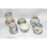 Group of mid-20th century Poole Pottery wares including a pot and cover, jar and cover, jug and