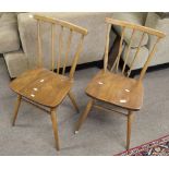 Early pair of Ercol mid-century teak kitchen chairs, (2)