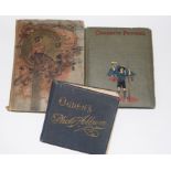 Group of three postcard albums, the first with Art Nouveau decoration including local views of