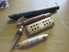 QUANTITY OF VARIOUS TREEN INSTRUMENTS VIZ WHISTLES AND A SMALL HARMONICA