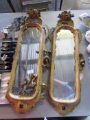 PAIR OF GILT WOODEN FRAMED MIRRORS WITH CARVED DECORATION THROUGHOUT (A/F), LENGTH APPROX 77CM