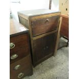 OAK FRAMED SIDE CUPBOARD WITH DROP FRONT OVER TWO CUPBOARD DOORS WITH BUTTON HANDLES