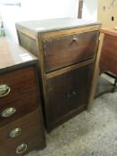 OAK FRAMED SIDE CUPBOARD WITH DROP FRONT OVER TWO CUPBOARD DOORS WITH BUTTON HANDLES