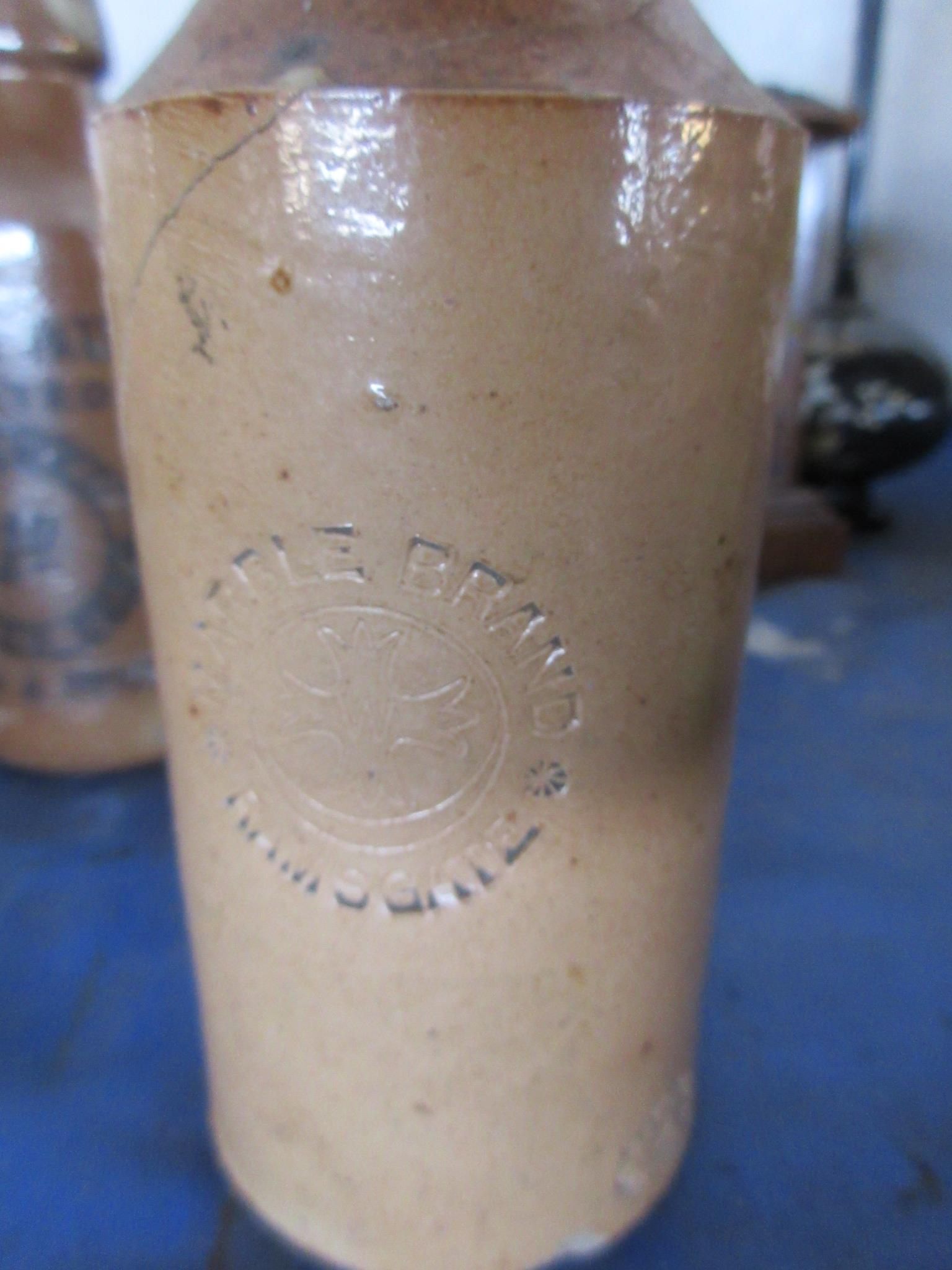 THREE SALT GLAZED STONEWARE BOTTLES INCLUDING STEWARD & PATTESON, NORWICH AND SWAFFHAM AND TWO - Image 4 of 4