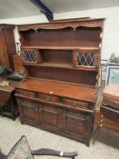 REPRODUCTION DRESSER WITH CARVED DECORATION