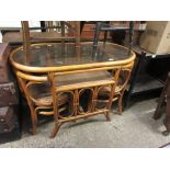 BAMBOO FRAMED OVAL TABLE WITH TWO INSERTED CHAIRS