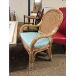 WICKER ARMCHAIR WITH TURQUOISE UPHOLSTERED CUSHION