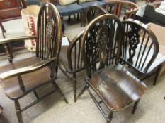 SET OF FIVE HARD SEATED STICK BACK WHEEL BACK CHAIRS COMPRISING FOUR DINING CHAIRS AND A CARVER