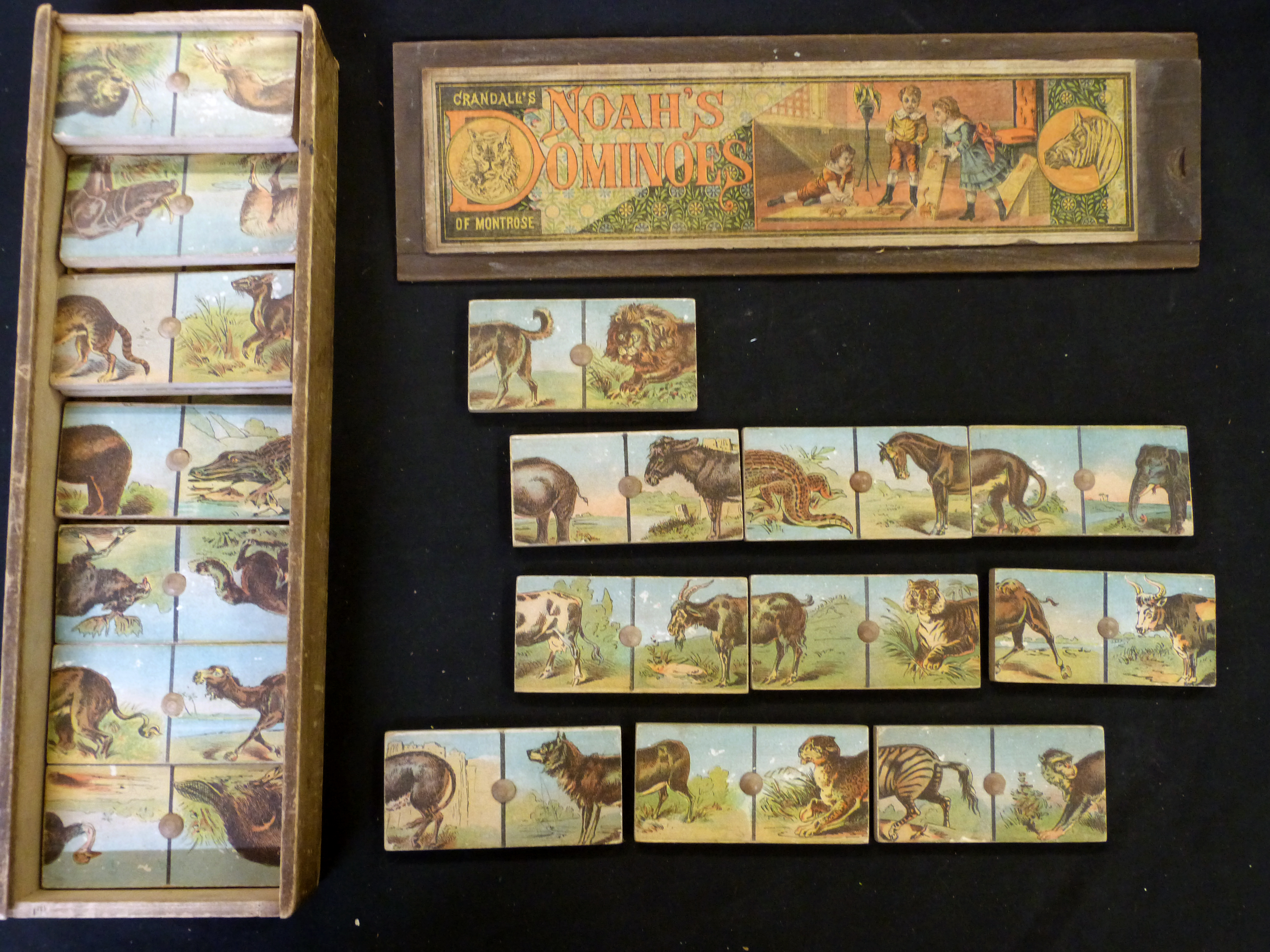 *Crandall's of Montrose (Pennsylvania) set of vintage "Noah's Dominoes", 28 coloured litho wooden