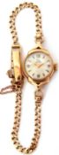 Ladies third quarter of the 20th century 9ct gold cased wrist watch by Record, gold hands to a