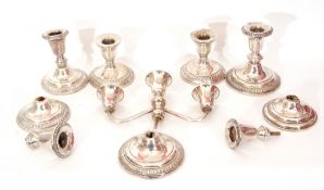 Mixed Lot: pair of white metal dwarf candlesticks, stamped beneath "Sterling weighted", 8cm high,