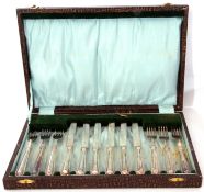 George V cased set of six silver handled dessert knives and forks, Birmingham 1930, maker's mark