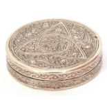 Continental white metal circular lidded box, the lid and sides chased and engraved with a