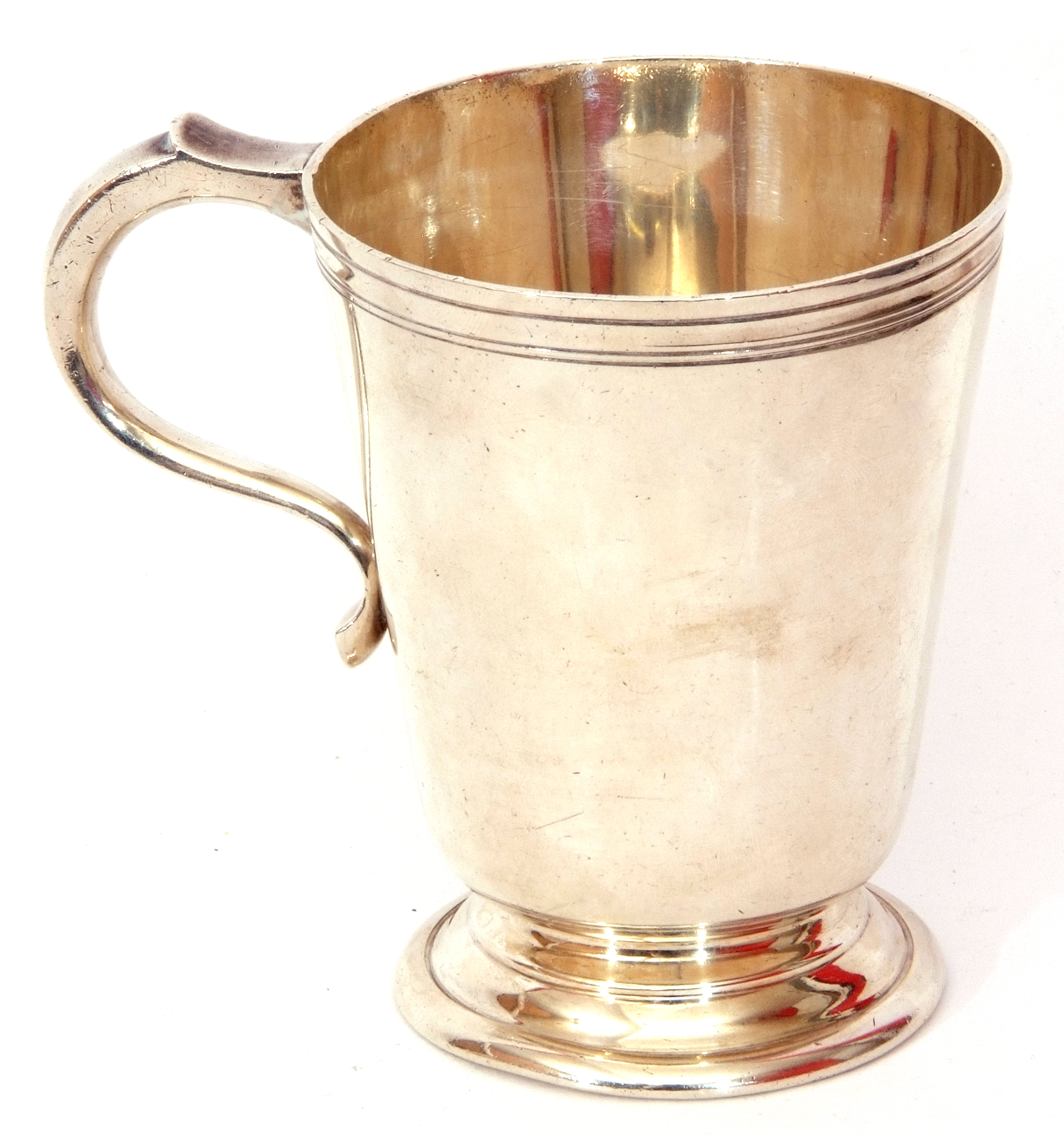 Mid-20th century silver mug, of polished tapering circular form, applied with scroll capped handle - Image 2 of 3