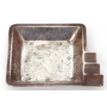 Continental white metal Art Deco style ash tray of square form with a graduated corner stepped