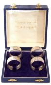 Cased Elizabeth II set of four silver napkin rings, Sheffield 1978, maker's mark J B Chatterley &