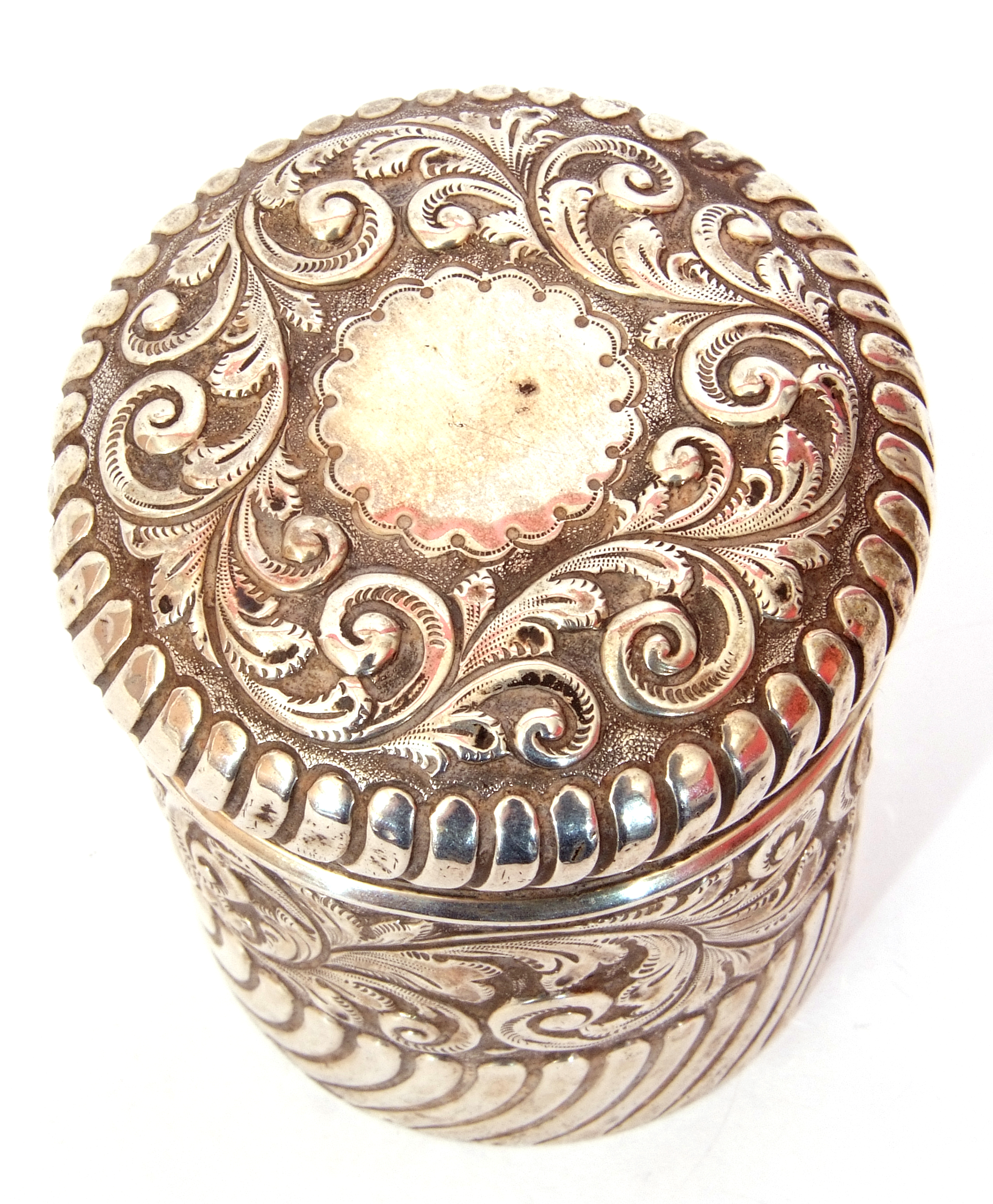 Late Victorian silver lidded canister of cylindrical form, embossed and wrythen decoration, - Image 2 of 3