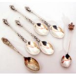 Mixed Lot: four silver Apostle spoons, London 1917, a tea spoon applied with a cast crowned