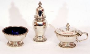 Elizabeth II three piece silver cruet set comprising a lidded mustard with blue glass liner, a
