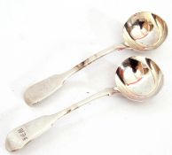Two Victorian silver ladles, Fiddle pattern, one handle engraved with a contemporary crest, the
