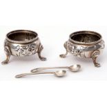 Small pair of Victorian cauldron salts, floral and foliate embossed supported on three curved