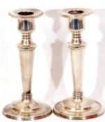 Pair of loaded "Sterling" candlesticks, baluster form, raised on spreaded loaded bases, Birmingham