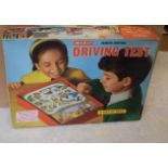 Merit driving test game, boxed, with Brimtoy train set, Tri-ang Busy Baby toy and other toys (boxed)