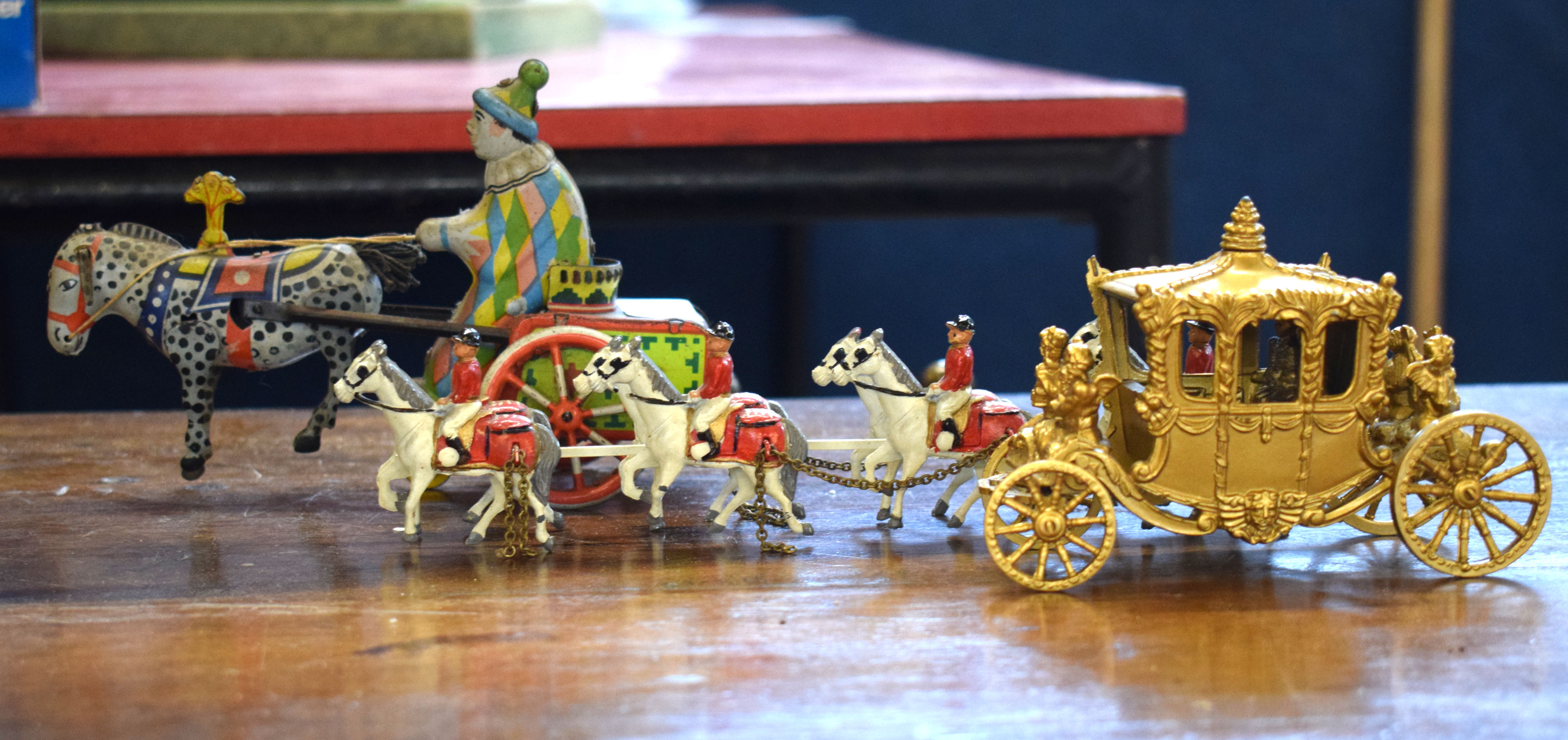 Early 20th century clockwork wind-up model of a horse and cart together with a model of the Royal