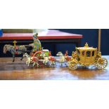 Early 20th century clockwork wind-up model of a horse and cart together with a model of the Royal
