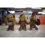 Group of three monkey band soft toy musicians including a drummer, cymbal player and castanet