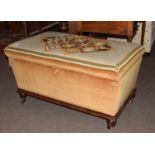 Victorian mahogany based and upholstered ottoman (pine lined), the wool work top featuring geometric