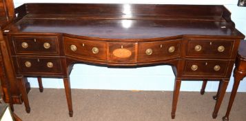 George III mahogany bow front sideboard having a single drawer to the bow, flanked to each side by