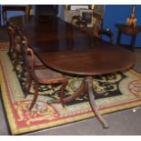 Good quality regency period mahogany triple pedestal dining table with two extra leaves, of