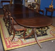 Good quality regency period mahogany triple pedestal dining table with two extra leaves, of