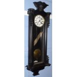 Victorian ebonised Vienna style wall clock with striking movement, overall height 109cm, max width