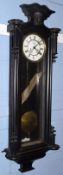 Victorian ebonised Vienna style wall clock with striking movement, overall height 109cm, max width