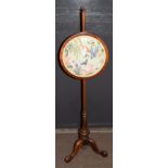 Victorian mahogany adjustable pole screen having a circular silk work panel of exotic bird and