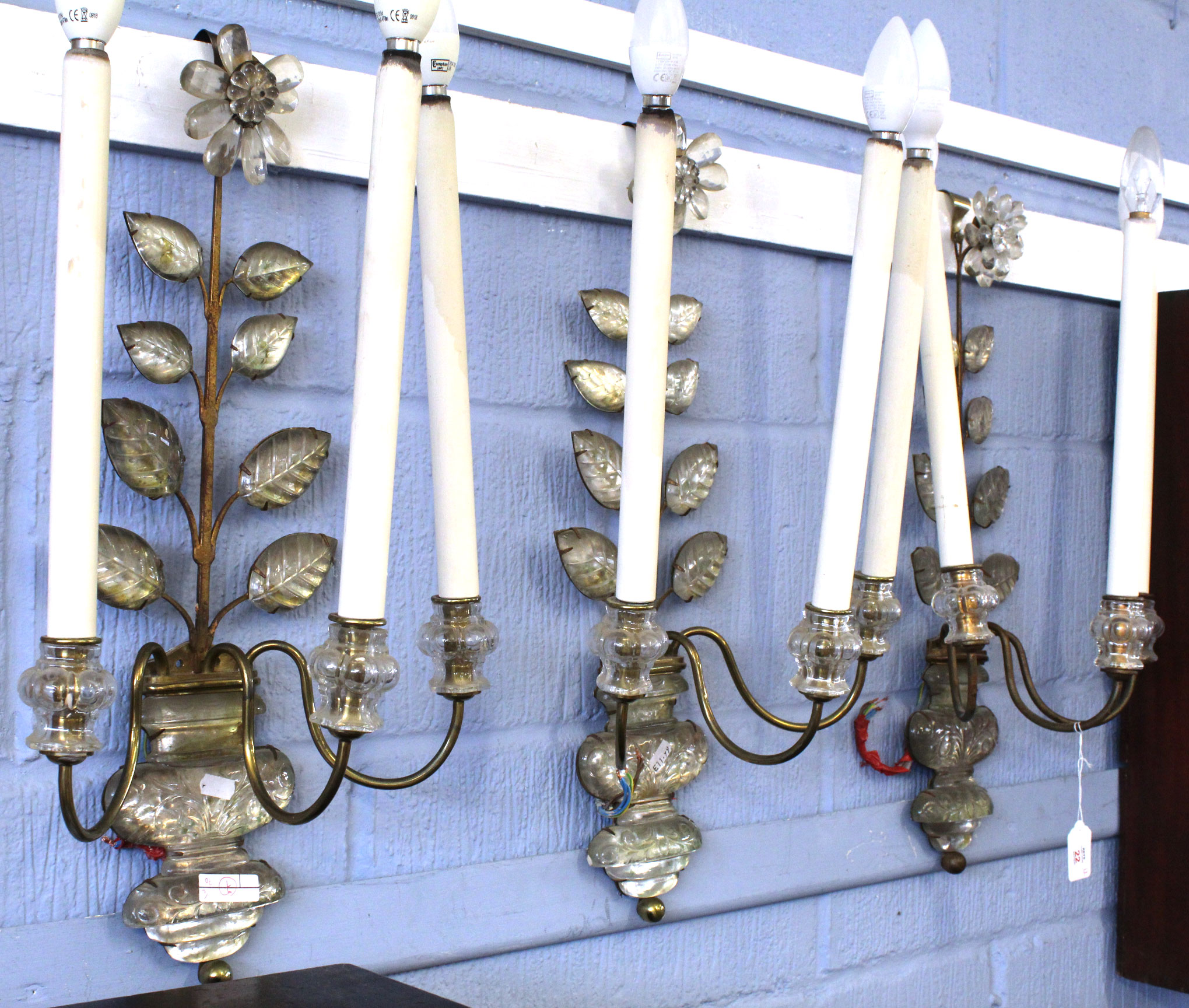 Interesting set of three metal and moulded glass light fittings in the form of flowering trees