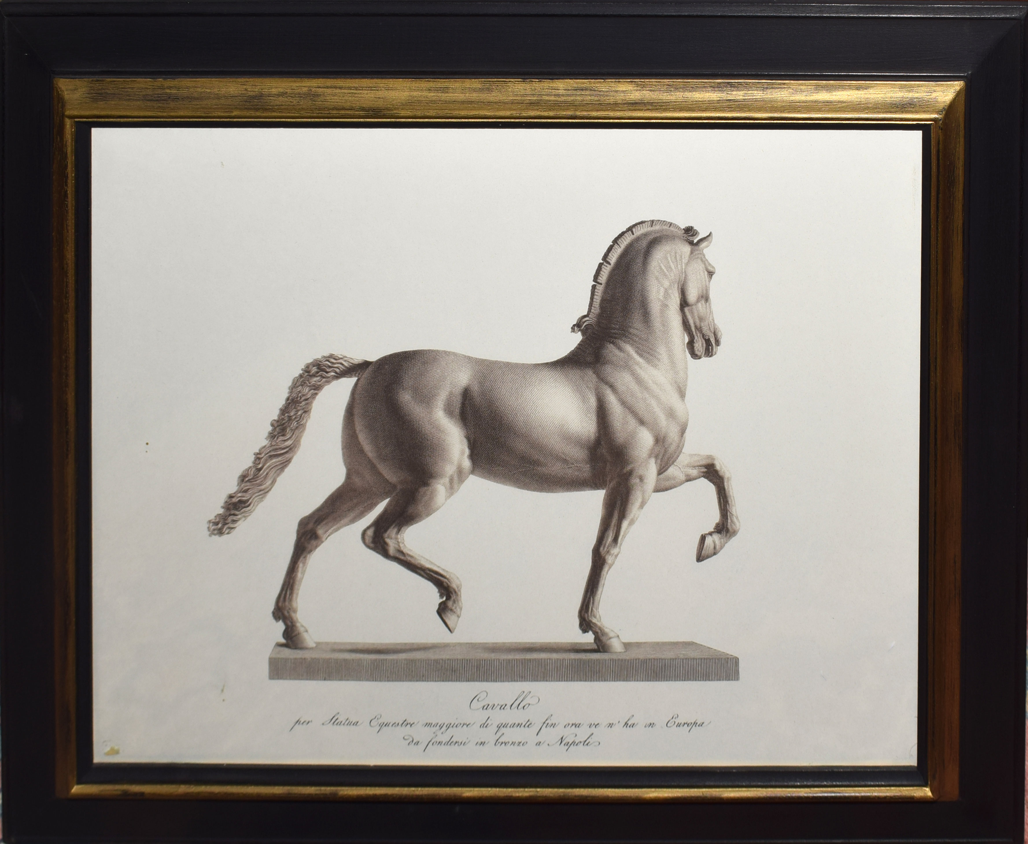 Pair of late 20th century reproduction sepia prints of prancing horse statuary "Cavallo", 39cm x