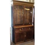 Early 20th century stained oak glazed top bookcase cabinet having two plain glass doors beneath a
