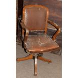 1930s oak framed and rexine covered office armchair with swivel mechanism (a/f)