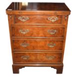 Early Georgian style burr walnut veneered small chest of four drawers with brass fittings, fold-over