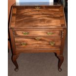 19th century small mahogany fall front bureau having cross banded flap over two graduated drawers,