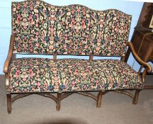 Queen Anne style oak framed triple hump back sofa with floral wool work coverings to back and seat