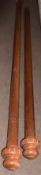 Two large mahogany curtain poles, with turned end finials, 280cm long, the other with one only