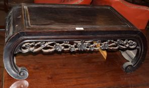 19th/20th century Oriental Padouk wood low tea table with fielded top, curved ends with prunus